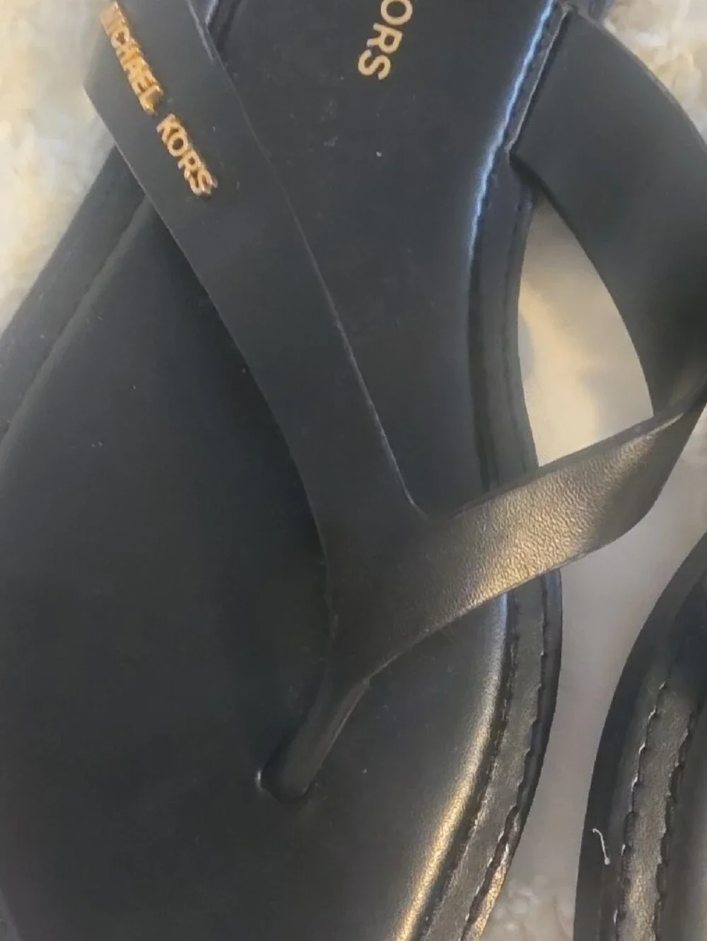 Michael Kors Black Slip-On Thong Sandals with Gold Logo